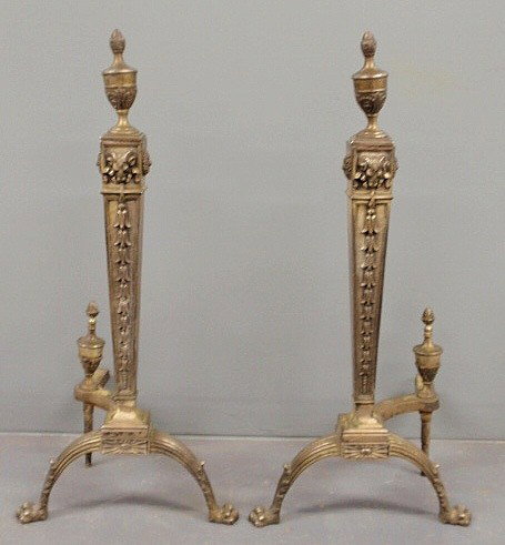 Adams style cast brass silver colored andirons. 2: Adams style cast brass silver colored andirons. 25.5”h.x11.5”w.x9”d.
