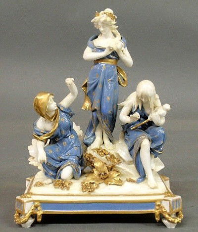 Capodimonte porcelain figural group with three yo: Capodimonte porcelain figural group with three young maidens. 10.5”h.x8”w.x4.5”d.