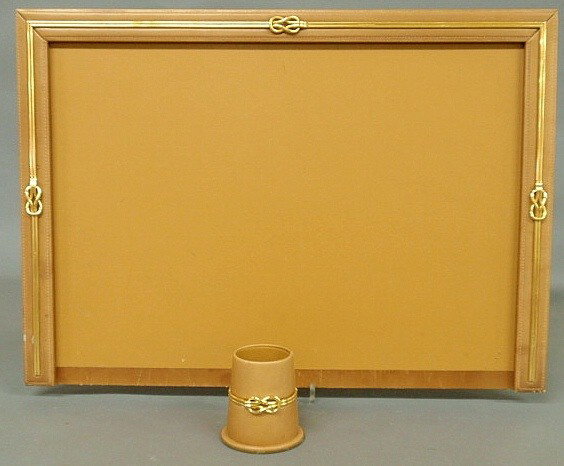 Italian desk set by Gucci, camel colored leather : Italian desk set by Gucci, camel colored leather with gilt line and knot trim to include a blotter 19.5”x27.5” and a pen & pencil holder.