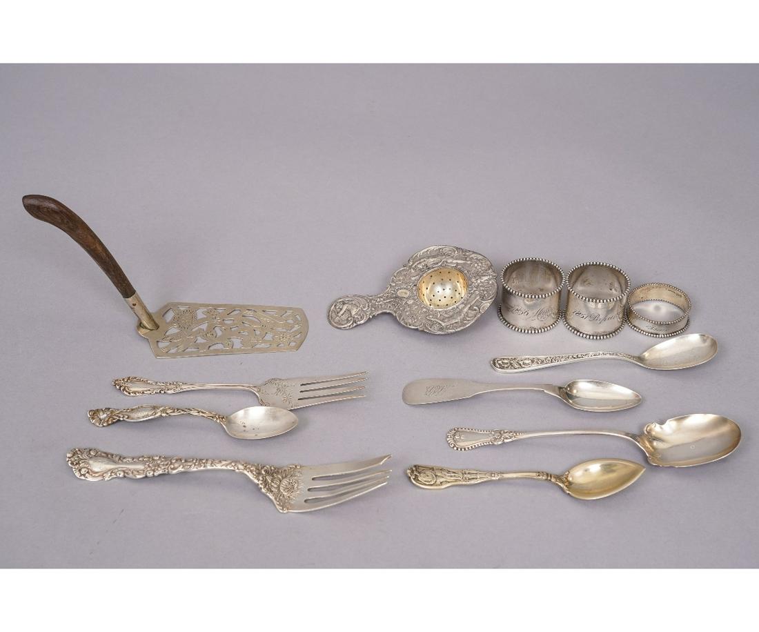 STERLING SILVER TABLEWARE: Sterling silver tableware and Mexican silver and a German tea strainer 5"l, napkin rings, etc.