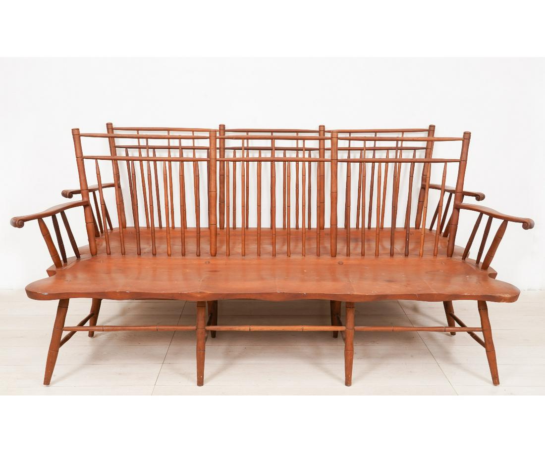 PAIR WINDSOR STYLE SETTEES: Pair of custom made Windsor style cherry settees with bamboo turnings, 20th c., with carved knuckle arm supports. 38.5"h x 82"w x 22"d / 16.5" seat height