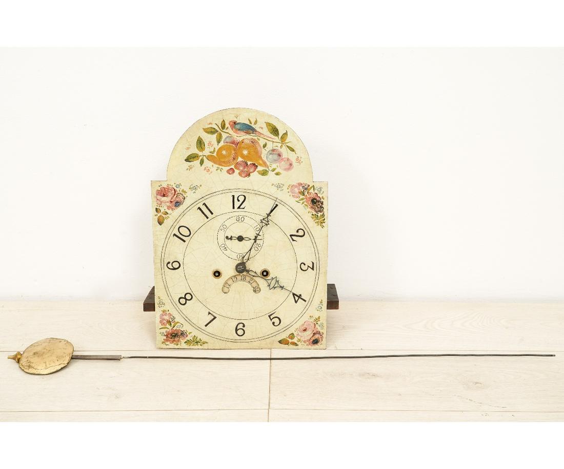 TALL CASE CLOCK MOVEMENT: 8-day tall case clock movement with painted dial, Arabic numerals and calendar wheel. 17.25"h x 12"w