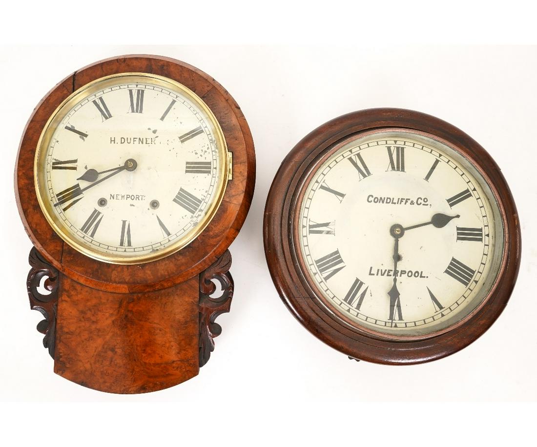 ENGLISH BURL WOOD PUB CLOCK: English burl walnut cased pub clock signed "H. Dufner", Newport, 22.25"h x 16"w x 5"d; together with another wall clock signed "Condliff & Co., Liverpool".