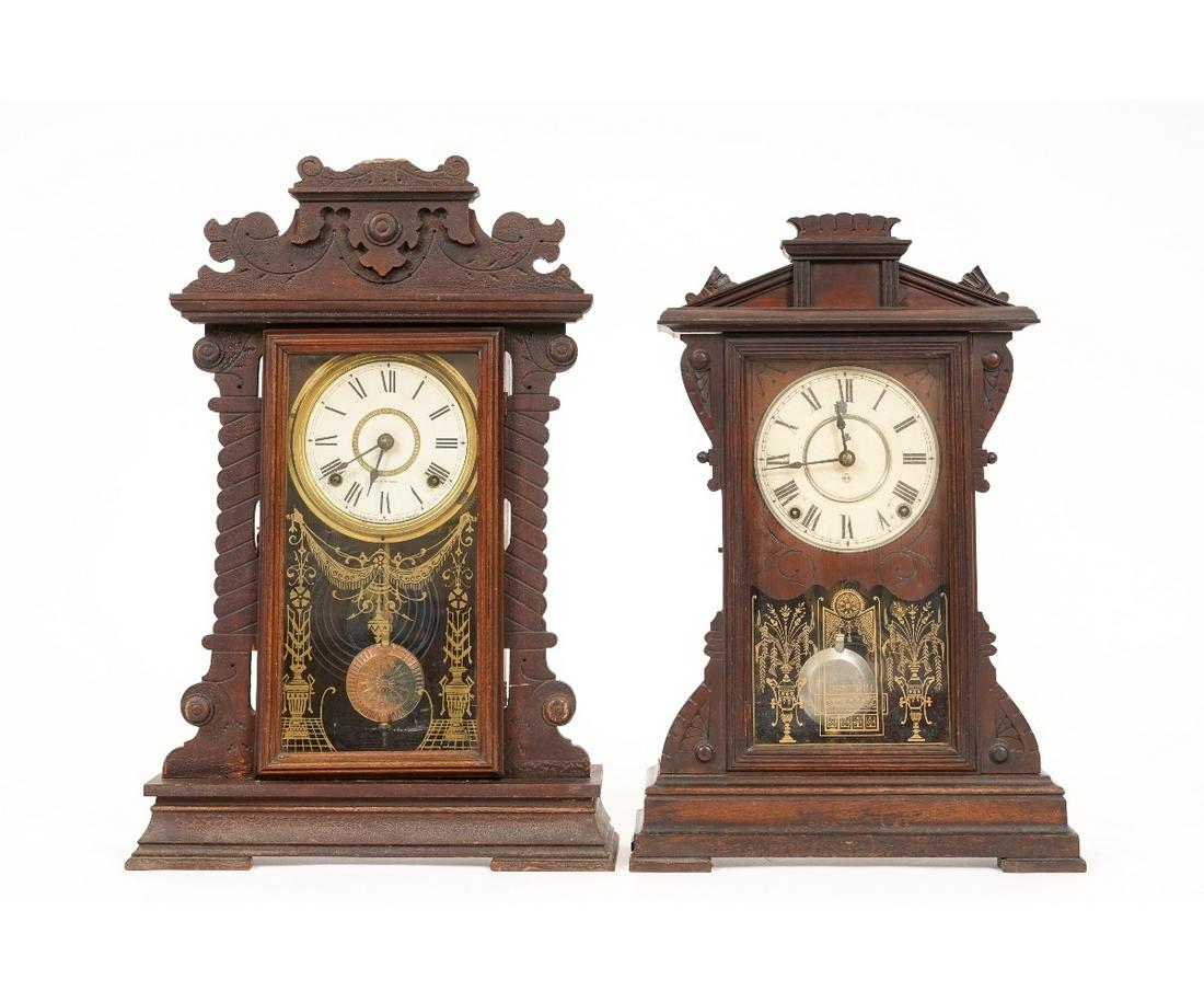 TWO SETH THOMAS CLOCKS: Two Set Thomas walnut carved mantel clocks. Tallest: 22.5"h x 15"w x 4.5"d