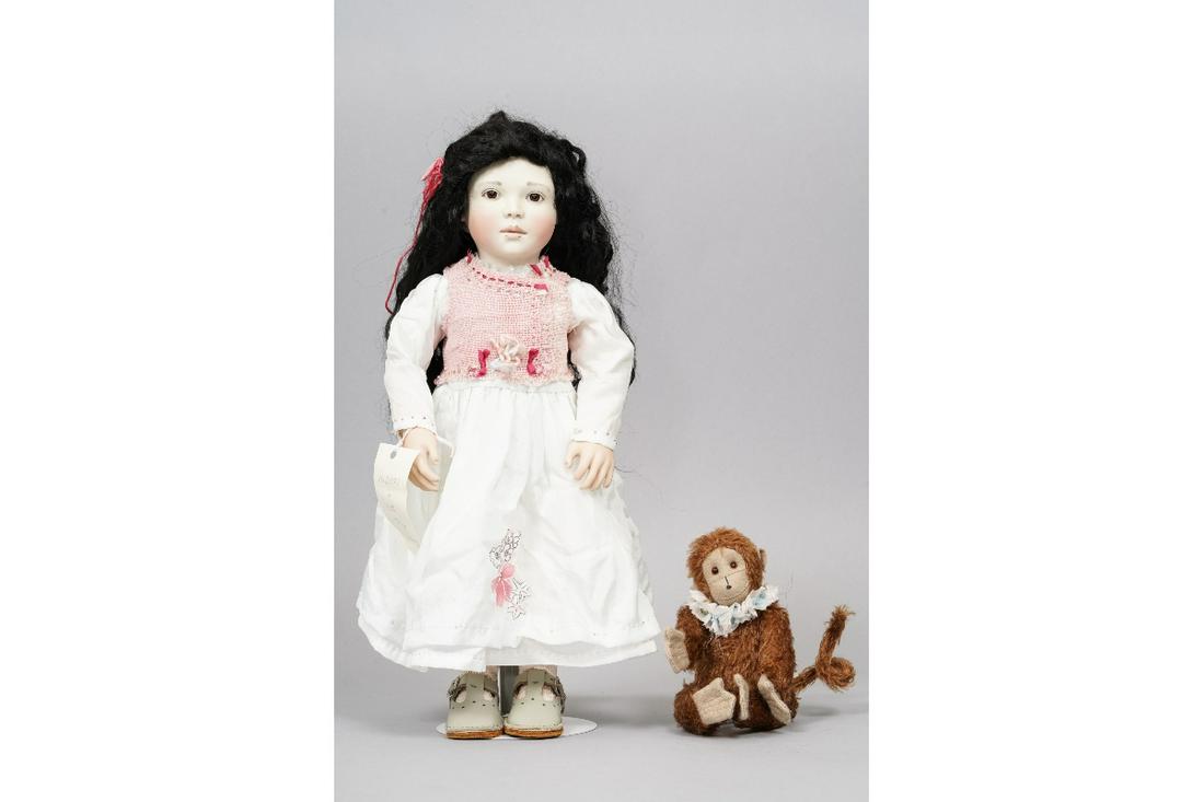 LYNNE & MICHAEL ROCHE "MIDORI": "Midori in Silk" artist doll by Lynne & Michael Roche, limited edition #2 of 30, 2006, porcelain head and hands, articulated wooden body; together with a mohair monkey companion by Stella Topping. 16.