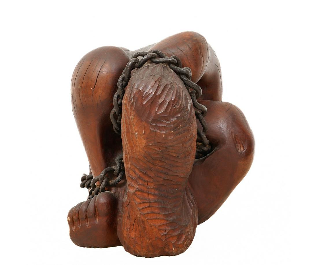 MODERNIST WOOD SCULPTURE: Michael Moser, 1975, carved cherry Modernist female sculpture titled "Chains That Bind". 19"h x 18"w x 18"d