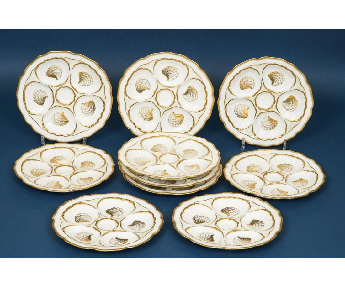 SET OF PORCELAIN OYSTER PLATES: Set of ten porcelain oyster plates by Richard Briggs. 9.25"dia