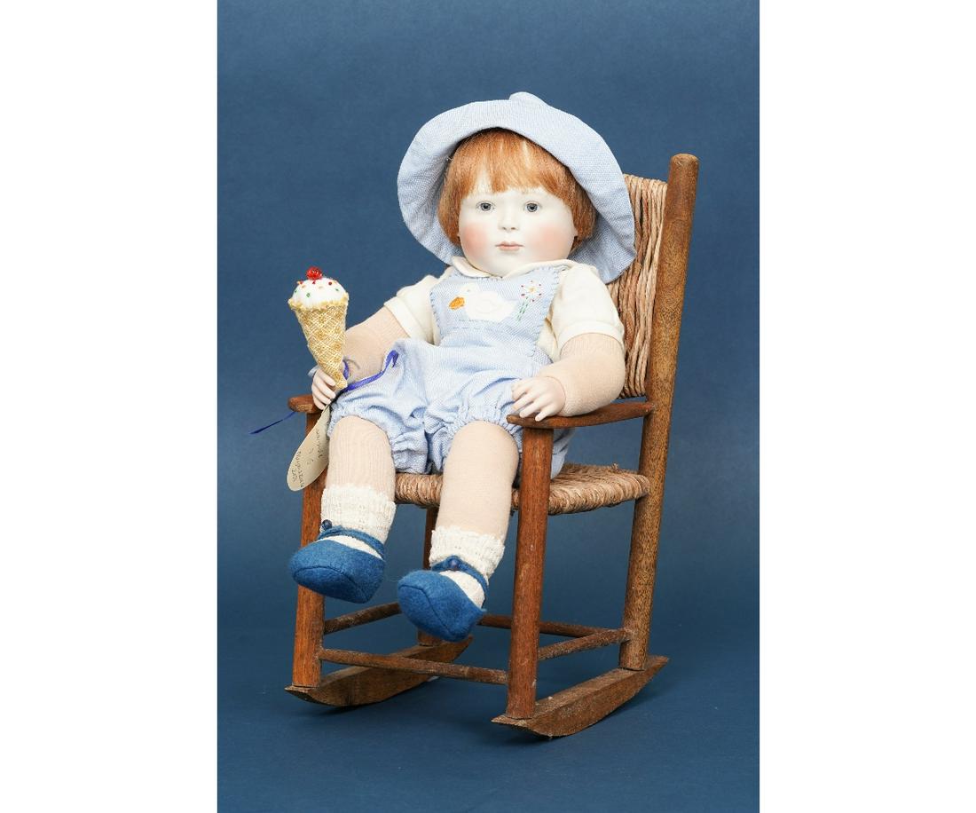 LYNNE & MICHAEL ROCHE "MOLLY BABY": Molly Baby "Molly Sea-Side" art doll by Lynne & Michael Roche, limited edition #7 of 15, porcelain head and hands, soft body, holding an ice cream cone and sitting in a chair. 15"h