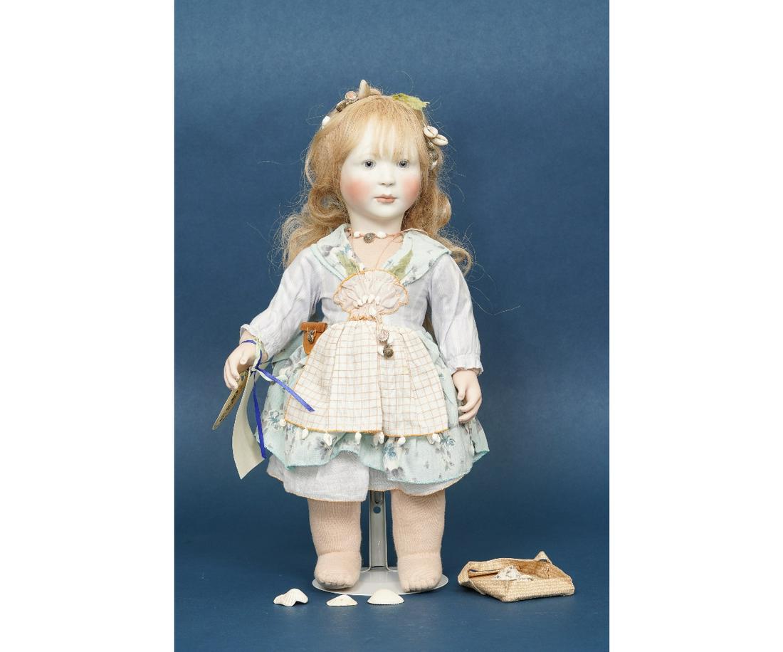 LYNNE & MICHAEL ROCHE "CHLOE": "Chloe as She Sells Sea Shells by the Sea Shore" art doll by Lynne & Michael Roche, limited edition #2 of 15 and dated 2002, porcelain head and hands, jersey knit body along with a beach bag with shel