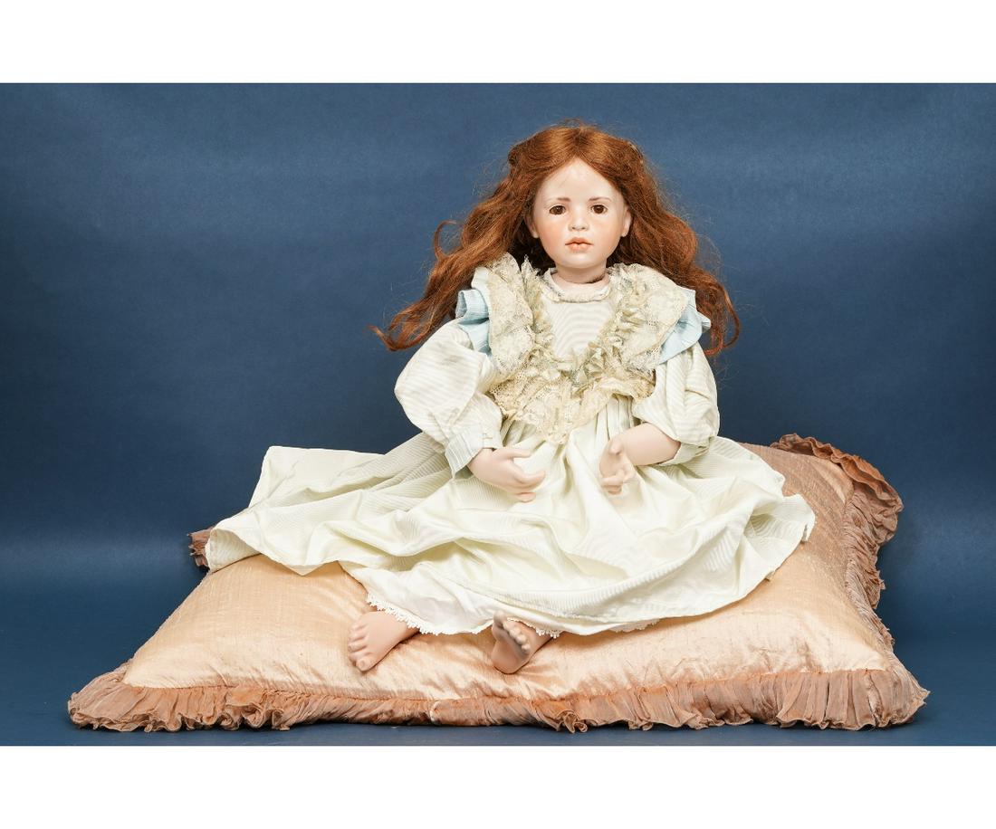 HILDEGARD GUNZEL WAX OVER PORCELAIN: Wax over porcelain art doll by Hildegard Gunzel, young girl doll, marked "Luitgard? 1991", in a light blue taffeta dress, large lace bodice and silk striped sleeves, brown eyes, auburn hair. 27"h / 7.