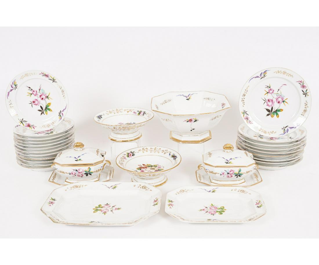 PARIS PORCELAIN CHINA SET: Paris porcelain partial china set, circa 1830, to include deep plates, covered sauce tureens, bowls, trays and a centerpiece dish, all with painted flowers.