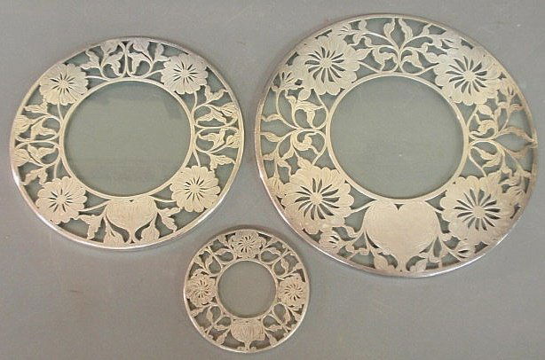 Three round silver overlay glass trivets, c.1920.: Three round silver overlay glass trivets, c.1920. 10”, 8” & 4” dia.