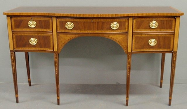 Baltimore Hepplewhite style inlaid mahogany serpe: Baltimore Hepplewhite style inlaid mahogany serpentine front sideboard labeled “Council Craftsman”. 37”h.x66”w.x23”d.