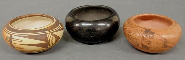 Two Hopi Indian decorated redware bowls one signe: Two Hopi Indian decorated redware bowls one signed “Juanita Healing” 3”hx5”dia., a Santa Clara Pueblo burnished black pottery bowl signed “MT” 3”h.