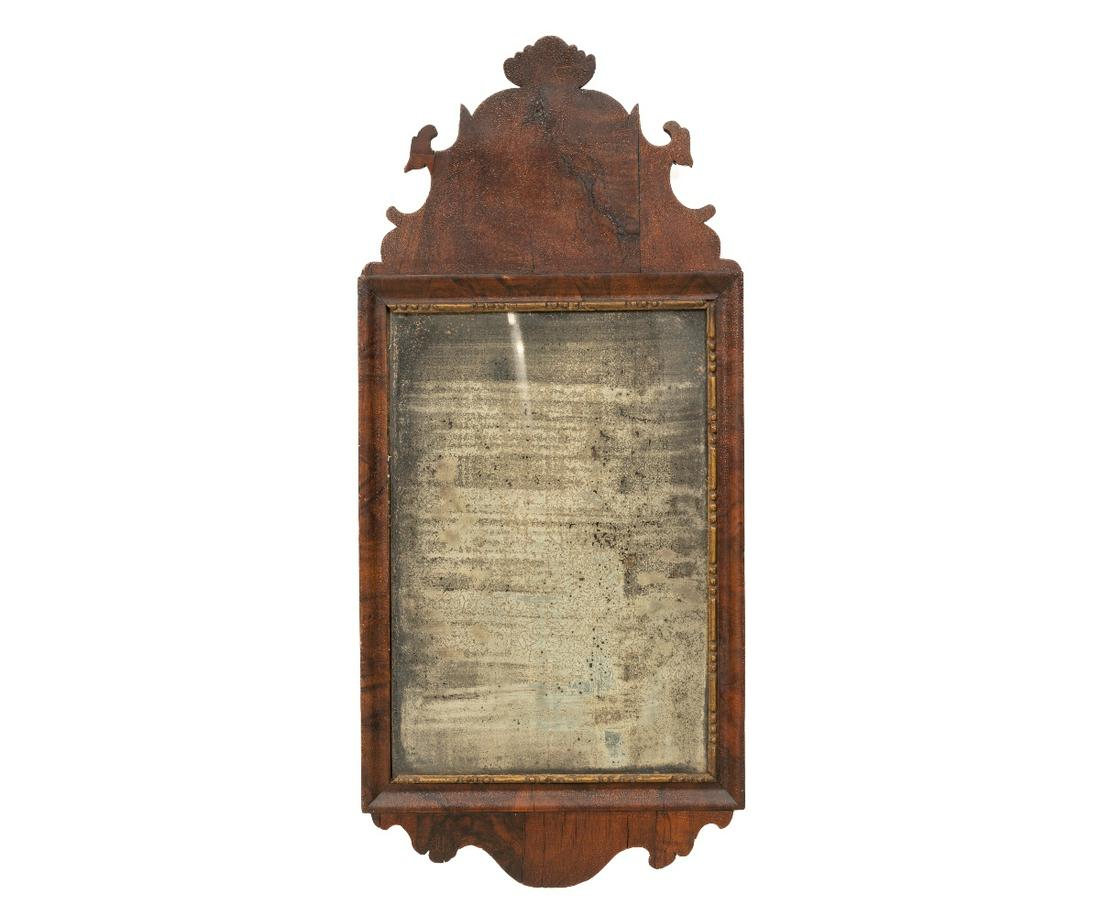 QUEEN ANNE MIRROR: Queen Anne mahogany veneered courting mirror with old glass and alligatored surface. 27.5"h x 12.5"w