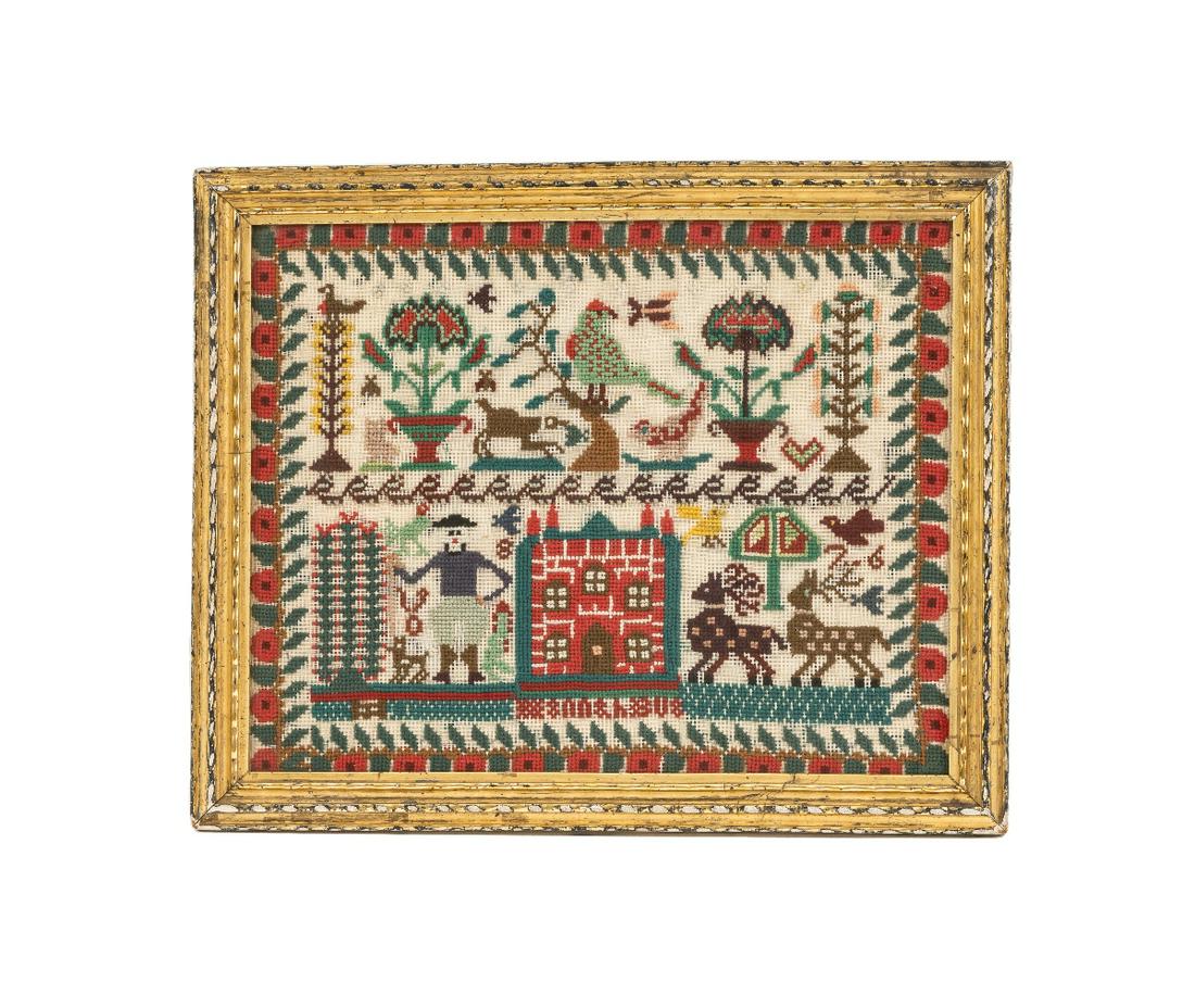 WOOL SAMPLER: Colorful wool sampler with strawberry border, potted flowers, animals, birds, figure and house, dated 1876, mounted in a gilt frame. 19" x 23" oa
