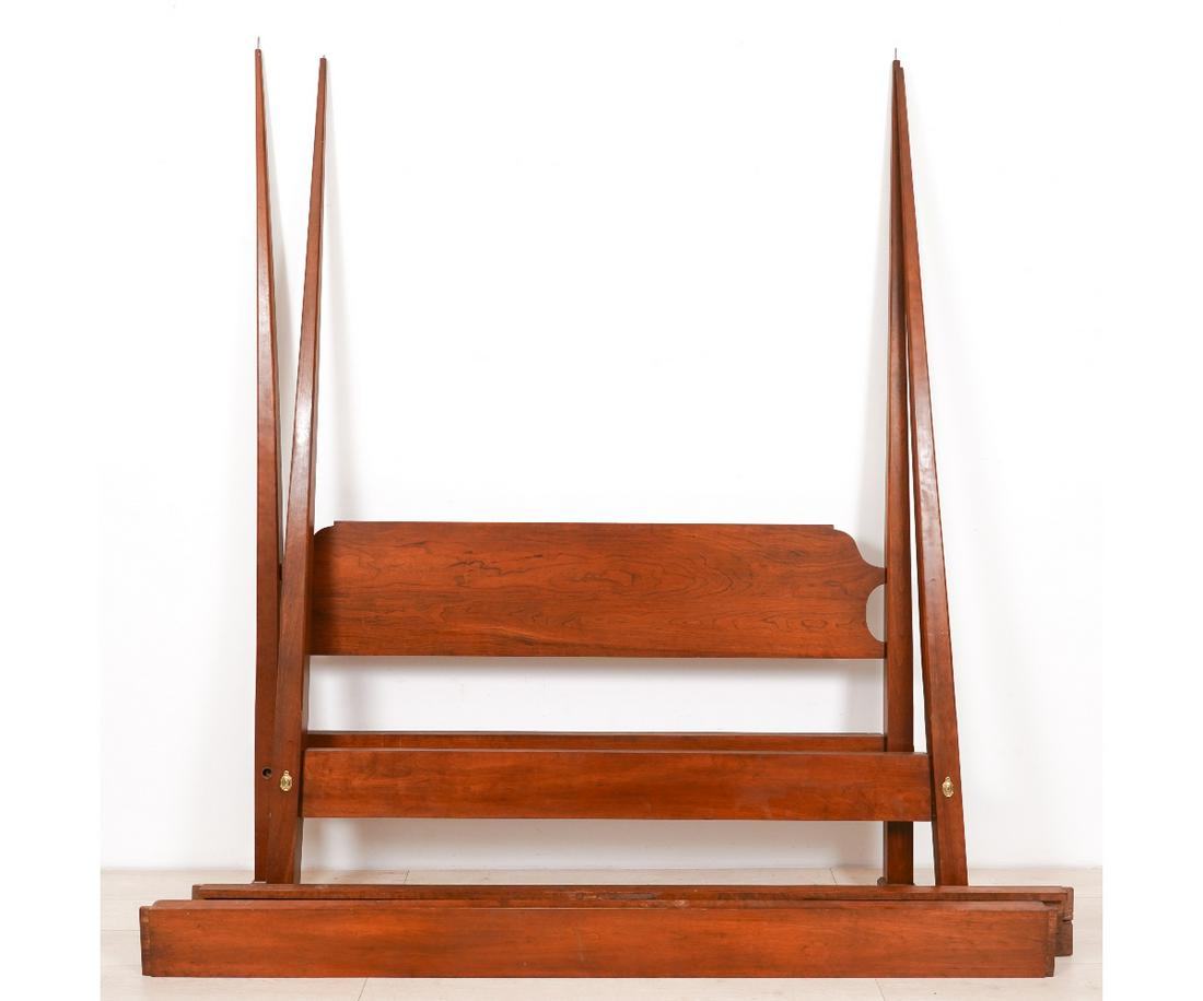 CHIPPENDALE STYLE QUEEN BED: Chippendale style cherry pencil post queen size bed. 91"h x 90"l x 70"w (overall) 83"l x 62.5"w (inside)