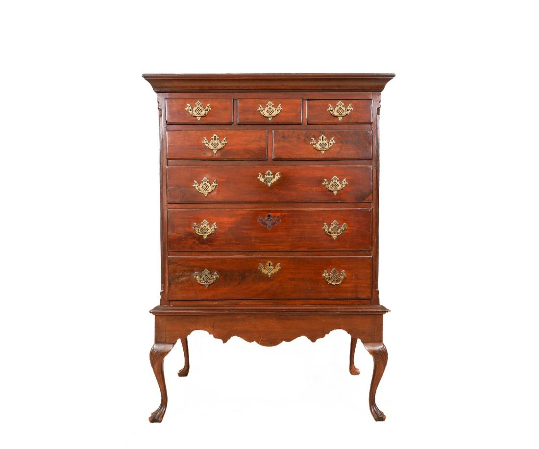 QUEEN ANNE CHEST ON FRAME: Queen Anne mahogany chest on frame, circa 1770, with molded cornice and fluted chamfered corners. 62"h x 44"w x 23"d
