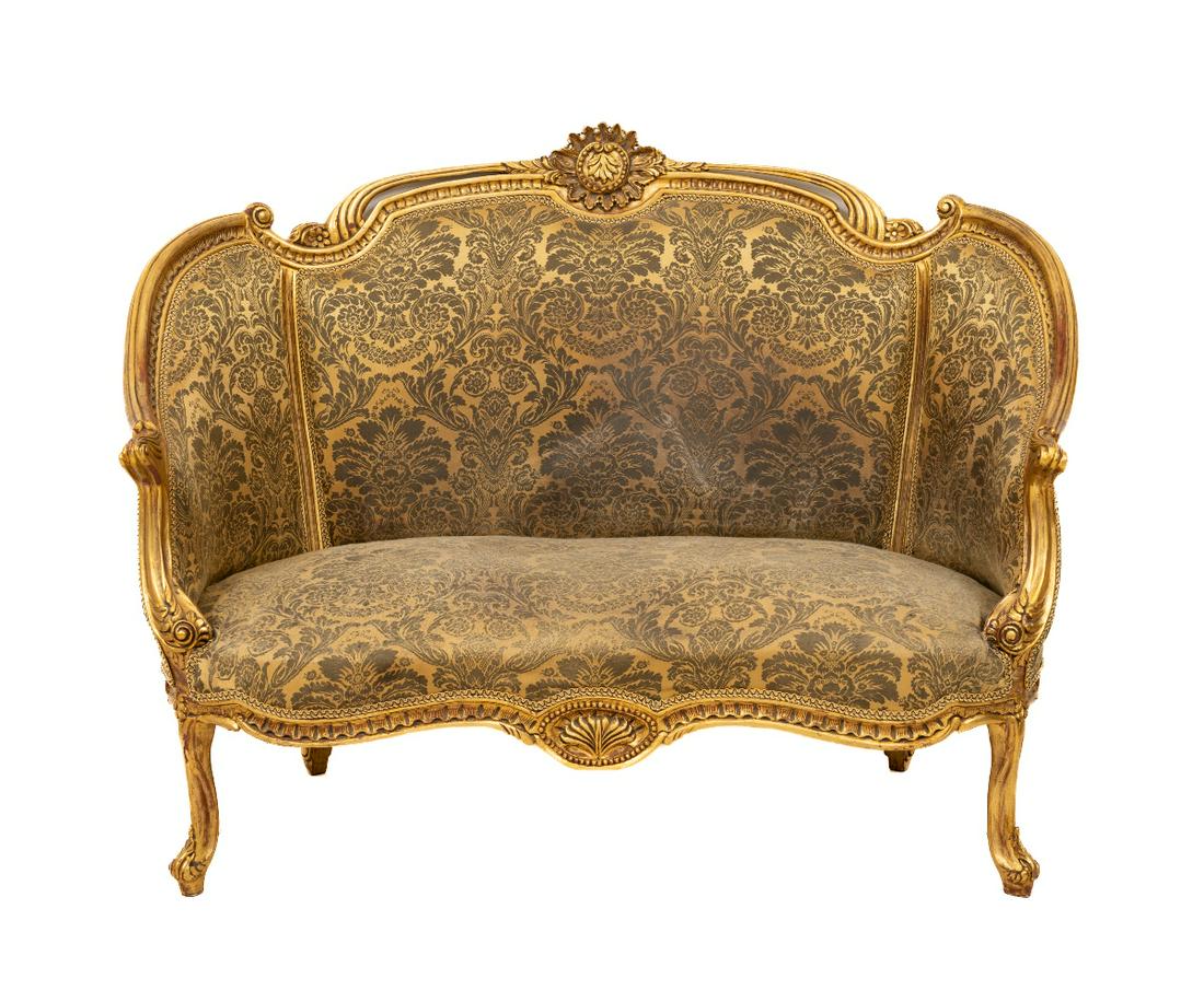 LOUIS XVI STYLE LOVESEAT: Louis XVI style gilt carved loveseat, 20th c. 42.5"h x 56"w x 22"d / 15" sh