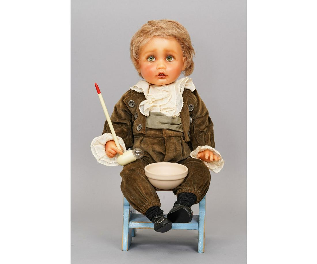CONNIE DEREK "BUBBLES" DOLL: Wax sculpture character doll by Constance Walser Derek of small boy called "Bubbles". Bubbles is dressed in a deep green velvet coat, frilled shirt, with a bubble blowing pipe and bowl, marked "Consta