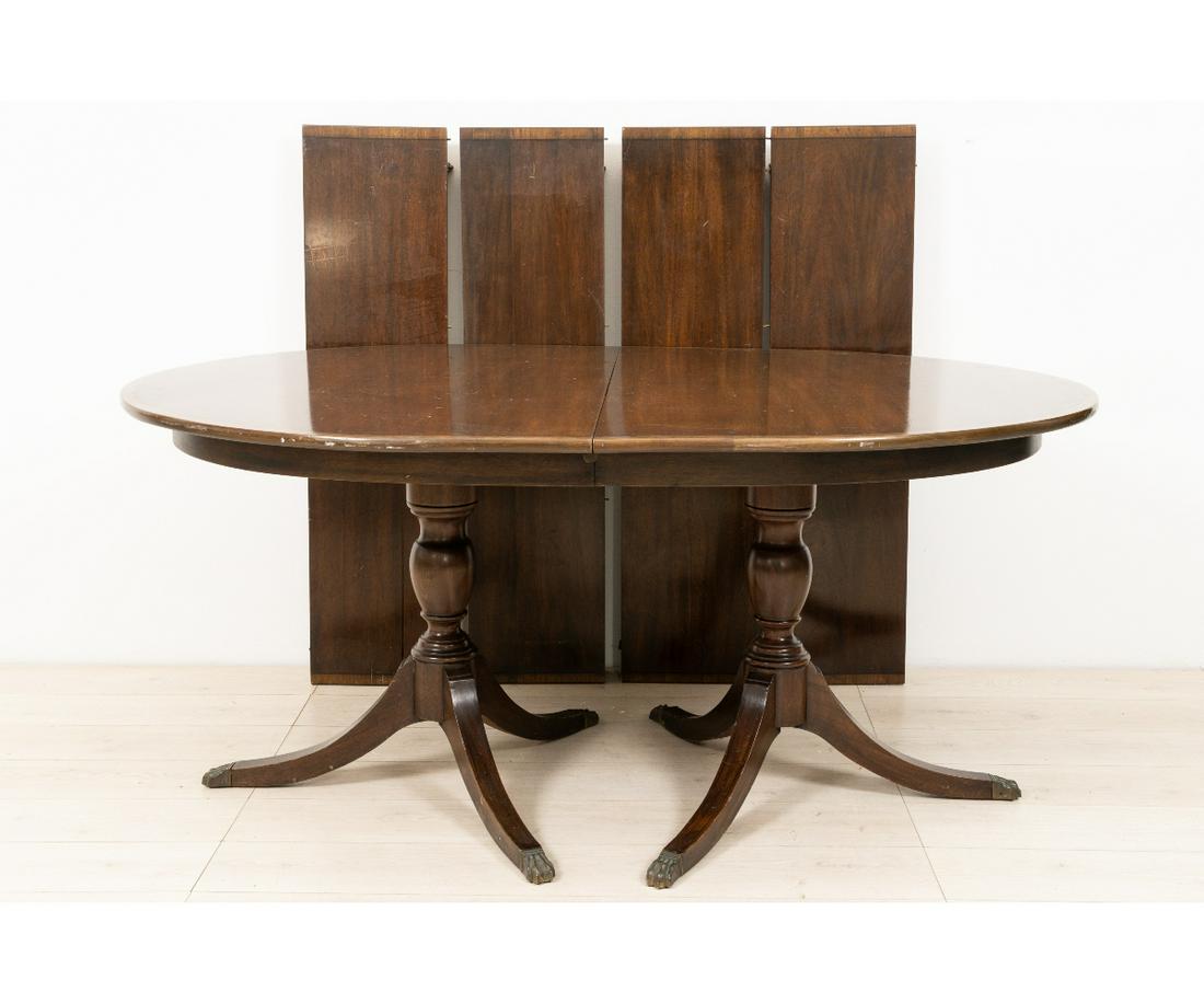 HINKEL HARRIS DINING TABLE: Virginia Galleries-Hinkel Harris Duncan Phyfe style mahogany double pedestal dining table with inlaid banding and four extra leaves, circa 1940. 30"h x 66"w x 48"d (closed) / Leaves: 12"w x 48"d