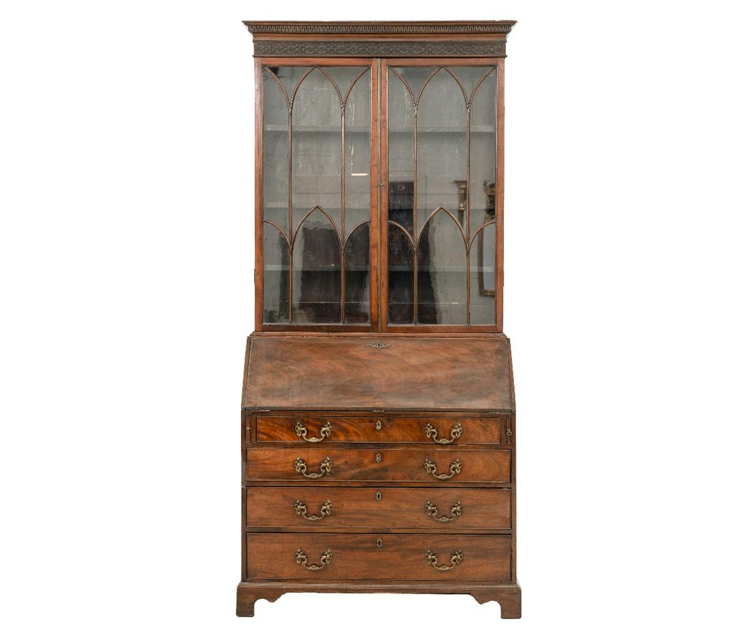 GEORGIAN CUBAN MAHOGANY SECRETARY BOOKCASE: Georgian Cuban mahogany two-piece secretary bookcase, circa 1770, with Greek key and blind fretwork cornice above two glass doors, all above a lid opening to a finely carved interior with parquetry in