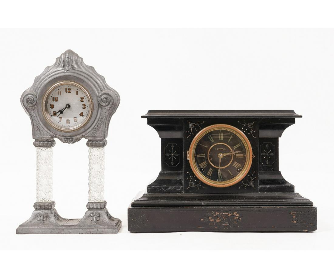 PAINTED SHELF CLOCK etc.: Faux marble black painted shelf clock (missing pendulum, no key, dial has wear); together with a crystal style glass and pewter clock. 10"h x 15.75"w x 7"d