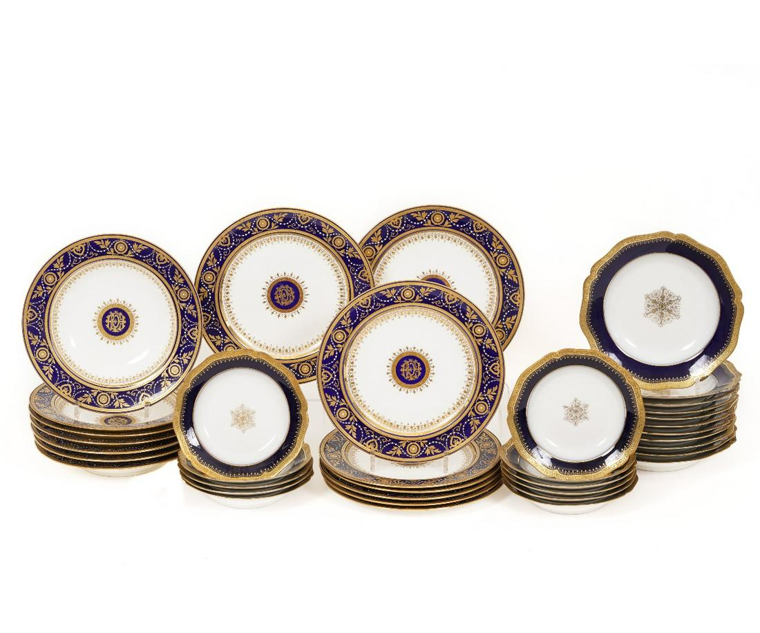 MINTON AND LIMOGES: Set of eight plates and seven bowls by Minton; together with Limoges pieces. Largest plate: 10.5" dia