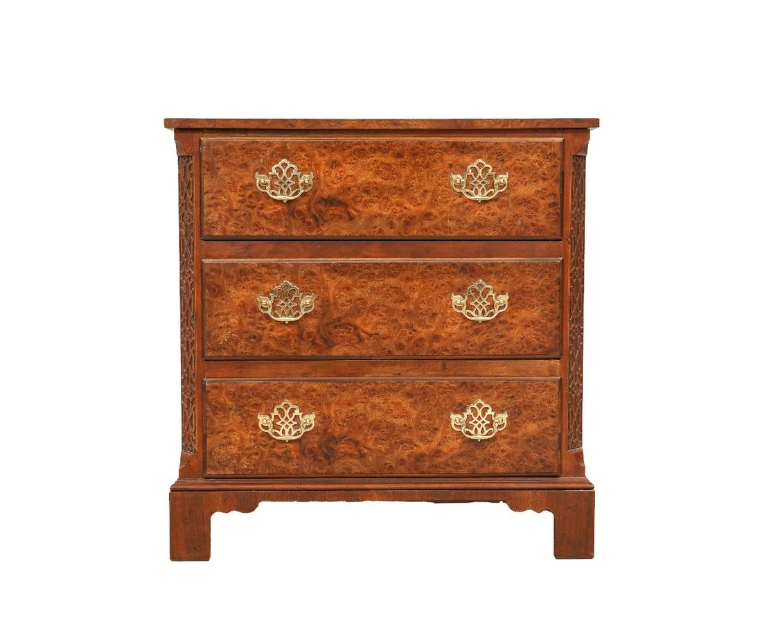 BAKER BURL WOOD CHEST: Baker burl wood figured Chippendale style small chest of drawers with blind fretwork, chamfered corners. 31"h x 30"w x 16"d