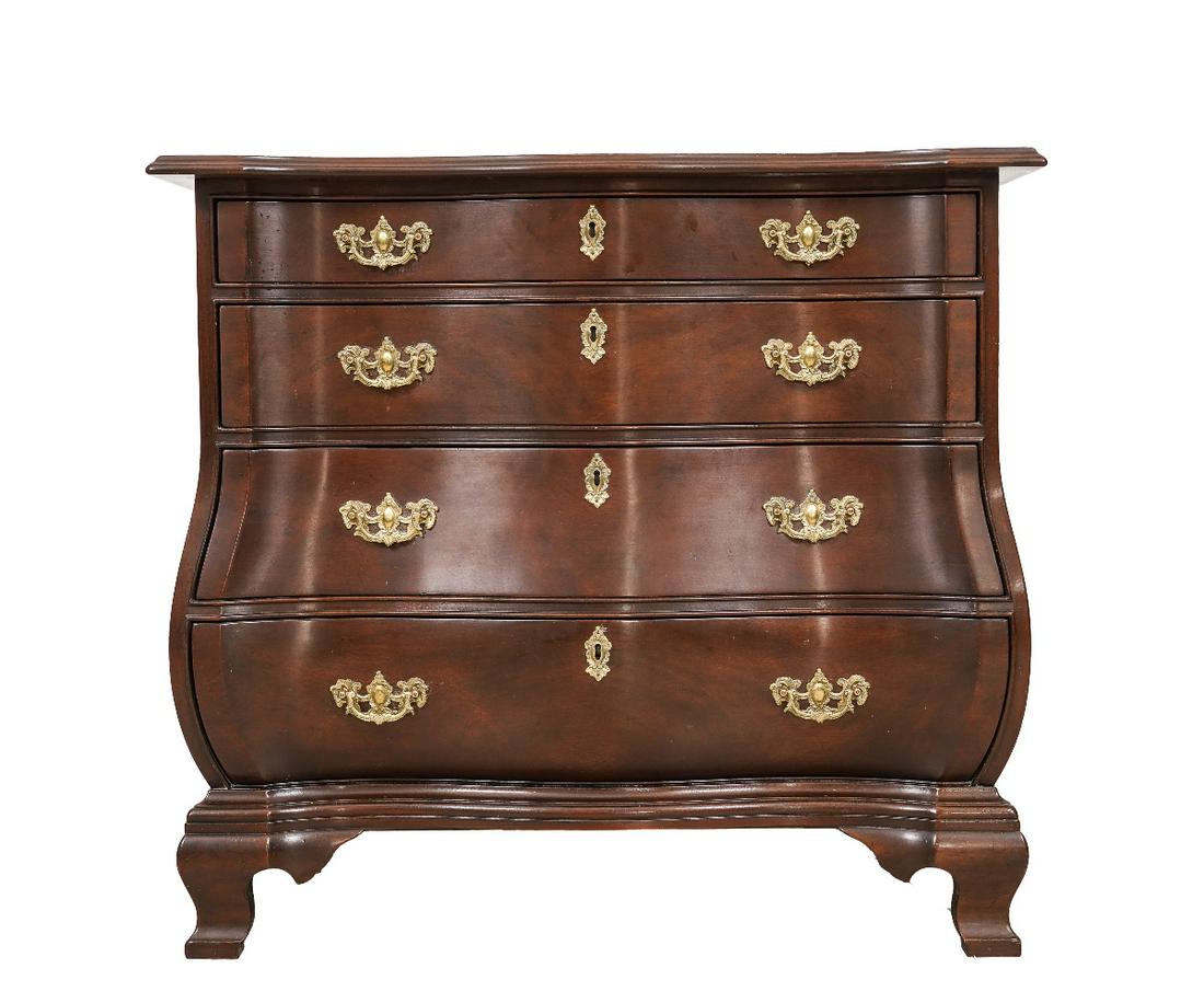 KITTINGER BOMBE CHEST OF DRAWERS: Kittinger Bombe Chippendale style mahogany chest of drawers. 30.5"h x 33.5"w x 20.75"d
