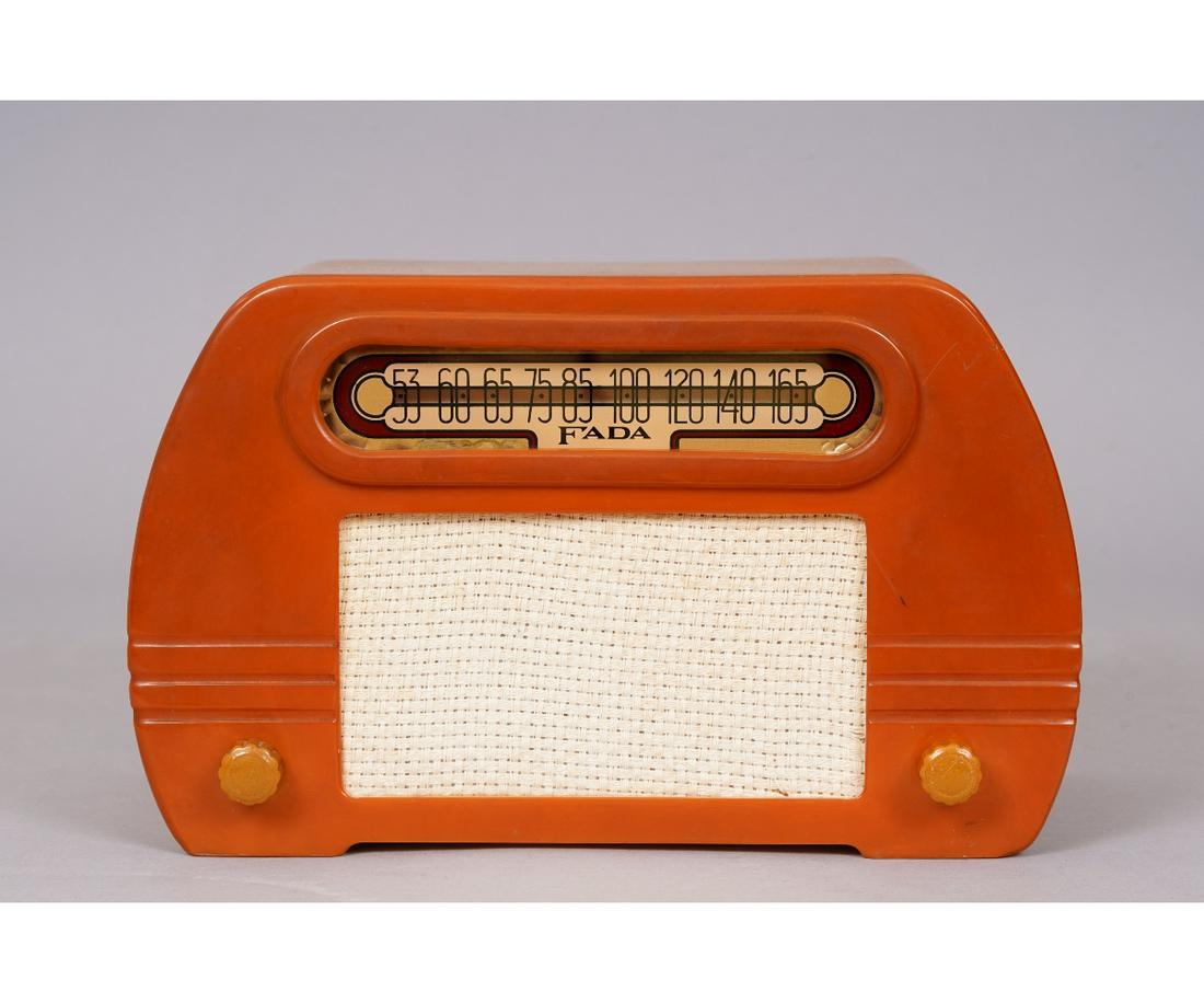 FADA MODEL 652 RADIO: Fada model 652 butterscotch color radio with original labels, circa 1946. 6.75"h x 11"w x 5.5"d