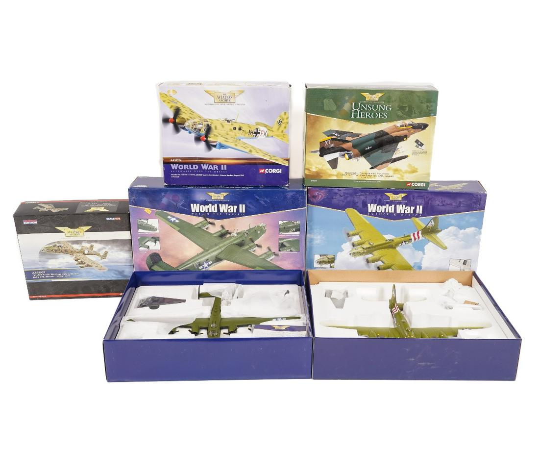 WWII MODEL AIRPLANES: WWII model airplanes to include a Corgi B-240 Liberator, limited edition 2414; together with a Boeing B-17F, 1:72 scale and others. 14.25"h x 20"w x 6"d