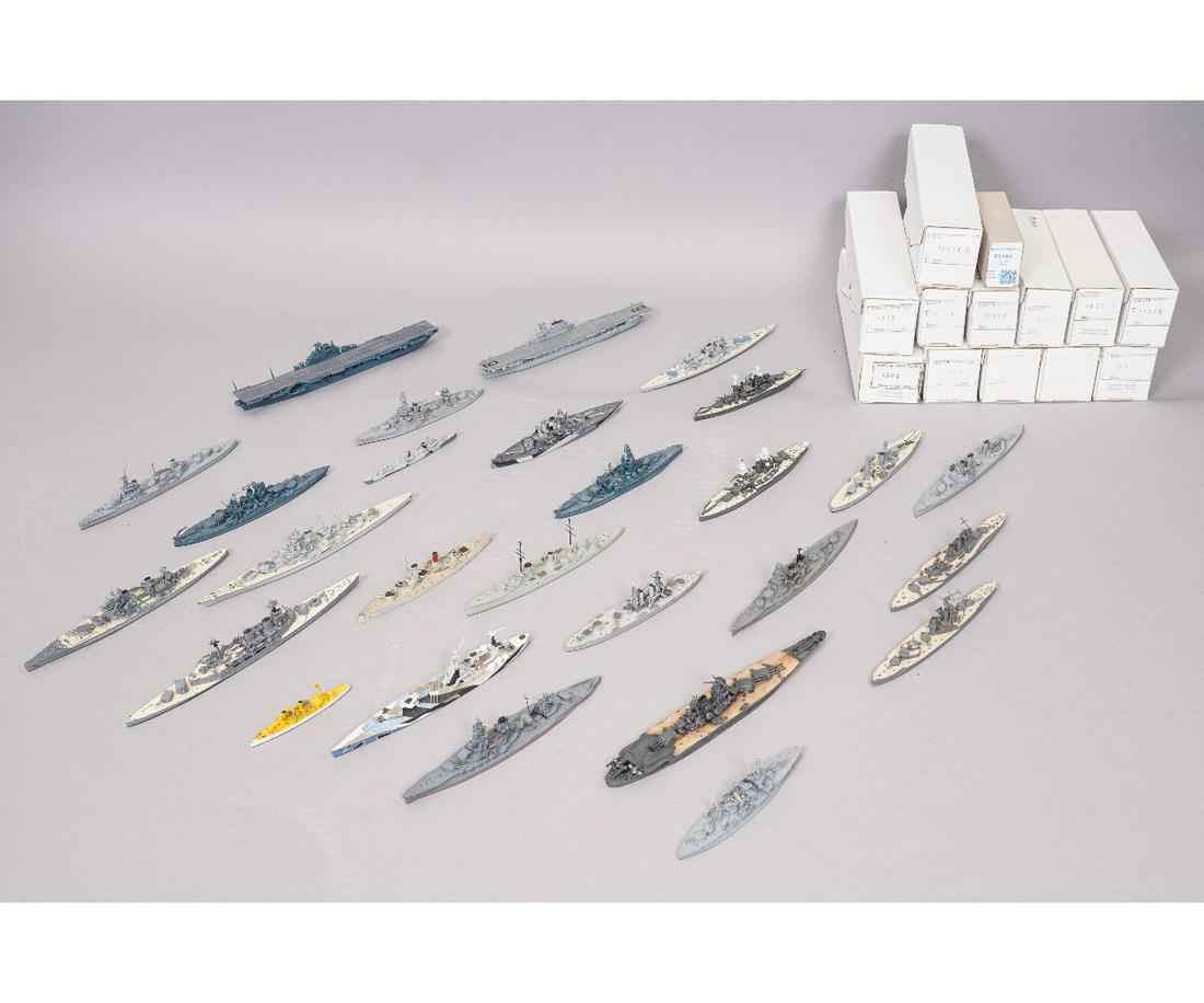 NAVIS METAL SHIP MODELS: WWII era metal waterline models by Navis representing various countries etc., 27 shown and 13 unopened. Largest: 8.5"l