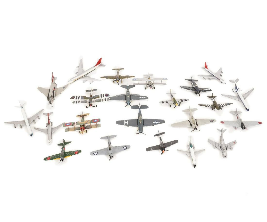 GROUPING OF DIECAST AIRPLANES: Grouping of diecast airplane models, various makers, some made in Japan, some include stands. Phantom: 2.75"h x 9.75"l