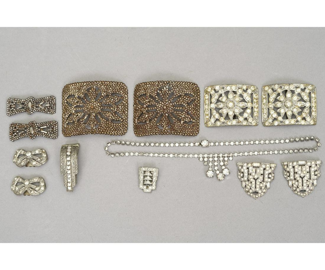 CUT STEEL SHOE BUCKLES etc.: Two pair of cut steel shoe buckles, the larger pair stamped 'Made in France'; together with other vintage shoe buckles and a necklace.Largest buckle: 2" x 2.5"