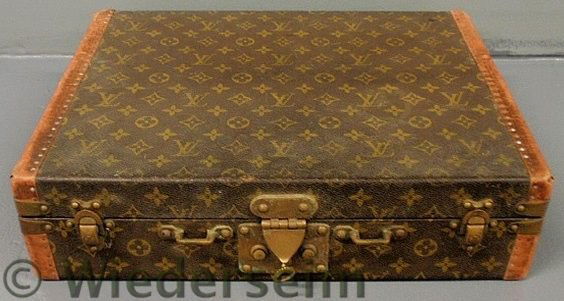 Louis Vuitton suitcase, c.1960, #878867, with ori: Louis Vuitton suitcase, c.1960, #878867, with original key. 4.5”h.x17”w.x13”d.