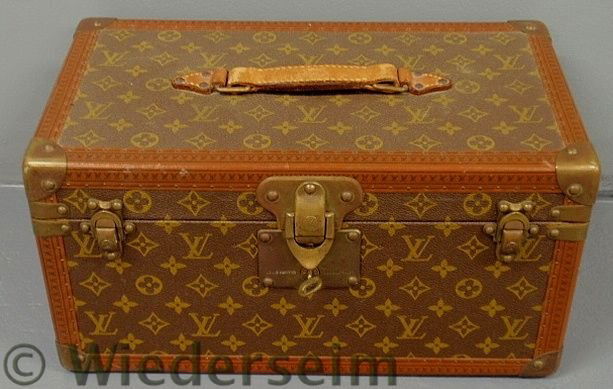 Louis Vuitton travelling dresser case, c.1960, t: Louis Vuitton travelling dresser case, c.1960, the interior of lid with mirrored back, #877747, and with original key. 8”h.x16”w.x9”d.
