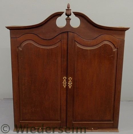 Chippendale style mahogany secretary desk top sec: Chippendale style mahogany secretary desk top section with a broken arch cornice, two raised panel blind doors and a shelved interior. 49”h.x43”w.x11.75”d.
