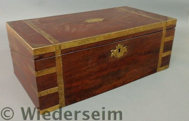 Brass-bound lap desk, c.1860, with brass candle s: Brass-bound lap desk, c.1860, with brass candle sockets, the top with brass plaque inscribed “John Dunlap Junr” and the lock marked “Tompson & Lambley, GR Patent”. 8.5”h.x22”w.x11.5”d.