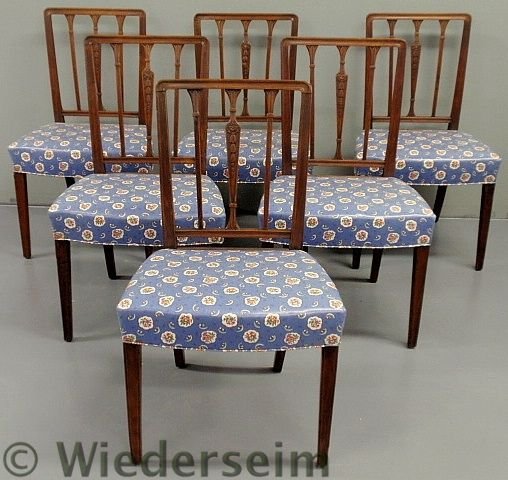 Set of six English Sheraton mahogany side chairs,: Set of six English Sheraton mahogany side chairs, the splats with center carved bellflower decoration and molded legs. 35”h.x21”w.x18”d., seats 18”h.