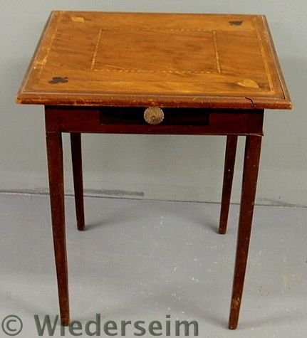 Hepplewhite style mahogany card table, the top wi: Hepplewhite style mahogany card table, the top with inlaid playing card suit symbols. As found. 29”h., top 24.5”x24.25”