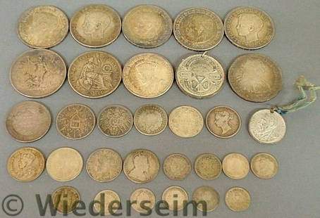 Group of foreign coins and medals TI- 1793 Spanis: Group of foreign coins and medals TI- 1793 Spanish coin, 1895 Puerto Rico pesos, 1871 Peruvian coin, Finnish coin, 1935 Canadian silver dollar., etc.