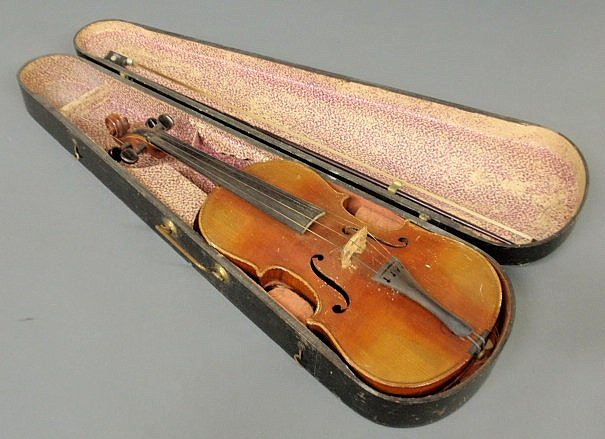 Wood cased maple violin labeled “Stradivarius”. 2: Wood cased maple violin labeled “Stradivarius”. 24”l.