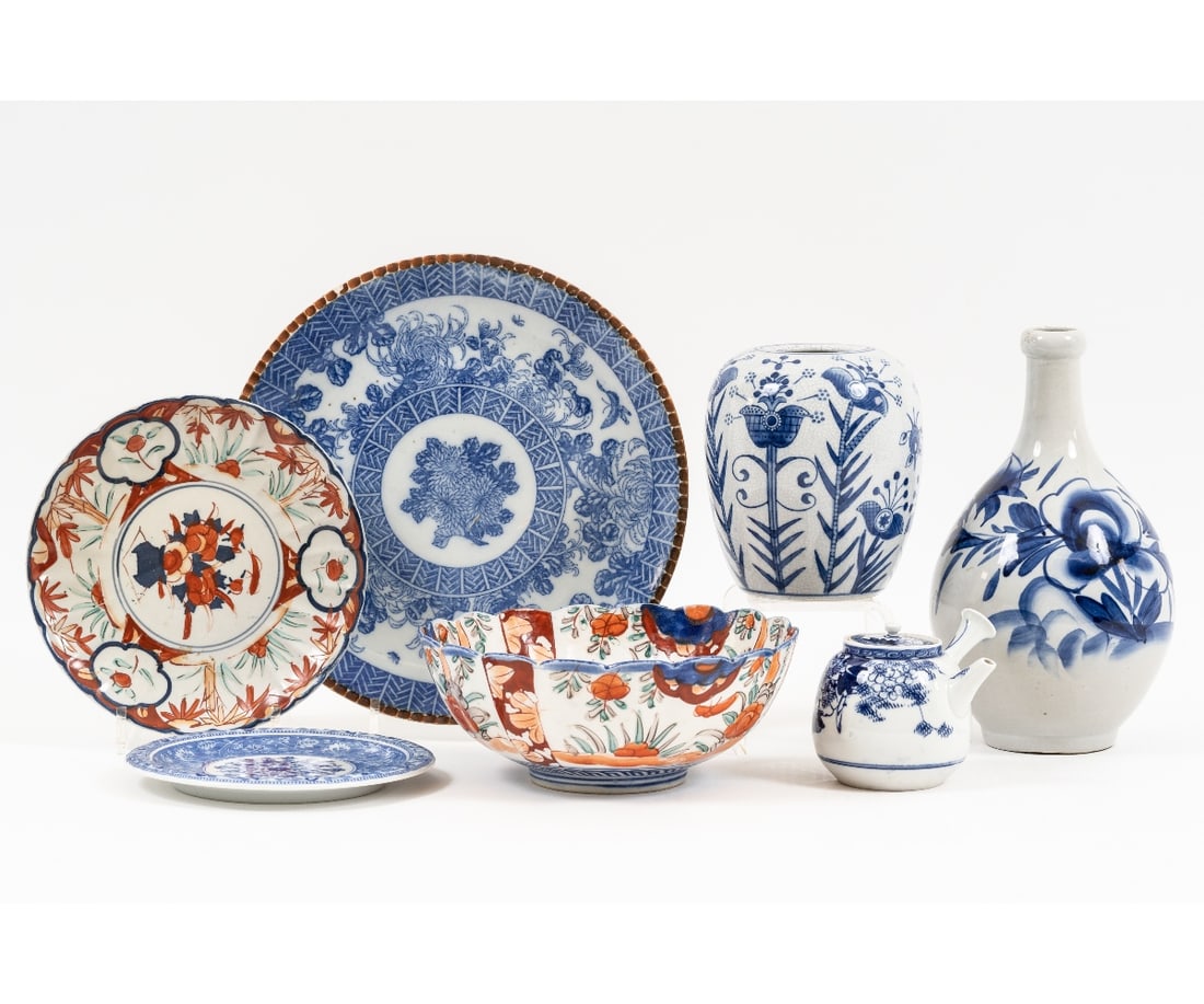 JAPANESE PORCELAIN TABLEWARE: Japanese porcelain tableware, mostly 19th c., to include a blue charger, Imari bowl and a vase. 7 pieces Vase: 11"h x 6"dia / Bowl: 3.75"h x 9.75" dia