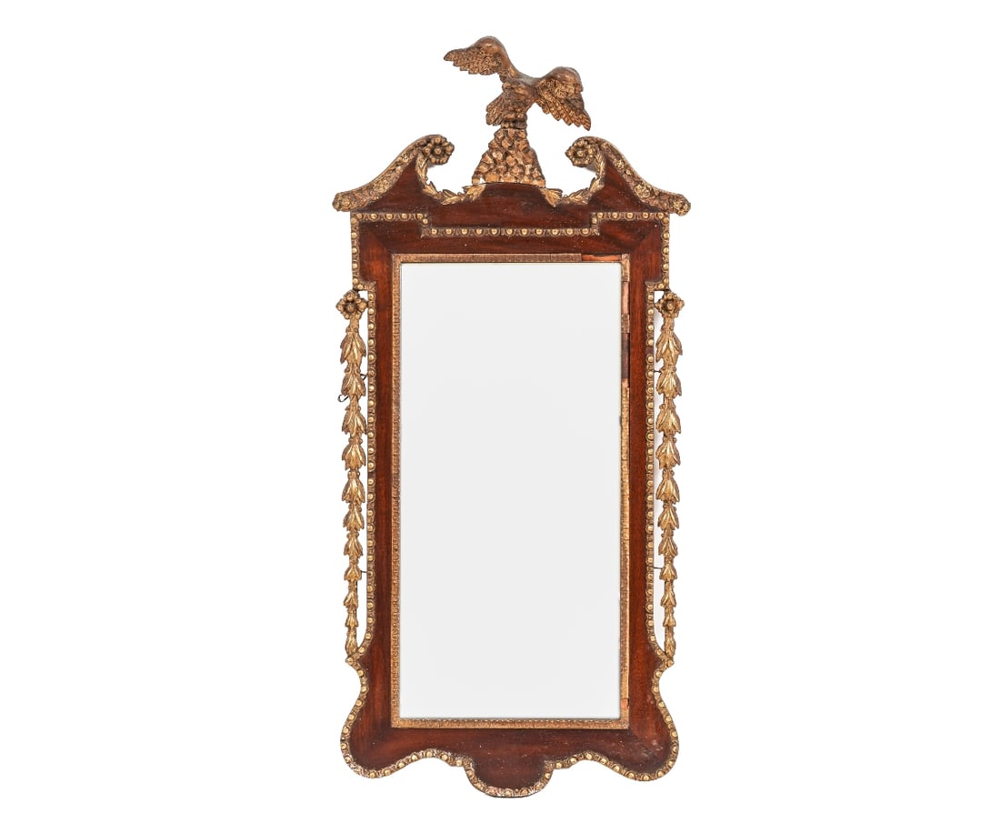 CHIPPENDALE STYLE MIRROR: Chippendale style mahogany mirror, circa 1920's, with phoenix crest. 44.5"h x 21.5"w