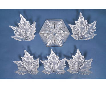 LALIQUE CHAMPS-ELYSEES LEAFS: Five Lalique Champs-Elysees crystal leaves (10"h x 10"w), all signed; together with a hexagonal base from a chandelier (12.5"dia).