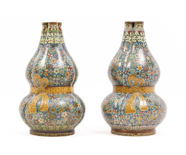 PAIR CHINESE CLOISONNE VASES: Pair of Chinese cloisonne triple gourd form bud vases, each decorated with yellow ribbon and mille-fleur design on a blue background with Qianlong mark, 20th c. 15.25"h x 9"dia