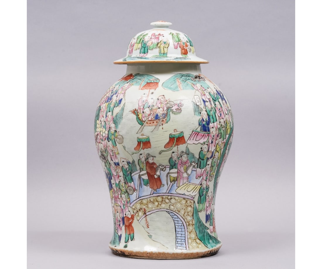 CHINESE PORCELAIN TEMPLE JAR: Chinese porcelain temple jar and cover decorated with colorful musical figures with crowds of people and a dragon. 18"h x 10"w