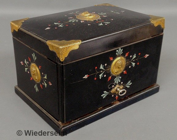 Egyptian Revival black cased mahogany humidor with : Egyptian Revival black cased mahogany humidor with brass mounts, late 19th c., and with pharaoh decoration. 7"h.x10.5"w.x7.5"d.
