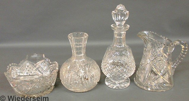 Four pieces of cut glass tableware- decanter 12.5"h: Four pieces of cut glass tableware- decanter 12.5"h., carafe, pitcher and ice bowl.